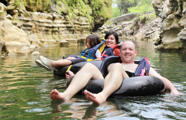 family on inflatable tube