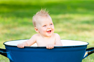 little girl take a bath in vintage tube