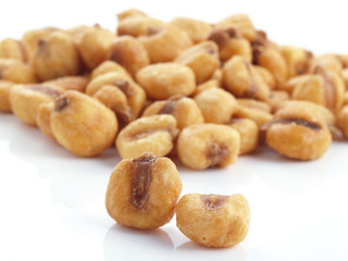 Close up of fried, salted corn seeds.