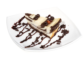 cheesecake with chocolate sauce.