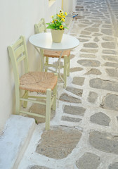 table chairs and flowers