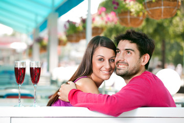 couple in love in a summer cafe