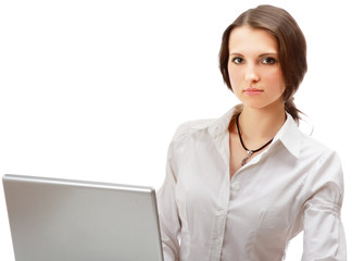 A young businesswoman working on a laptop