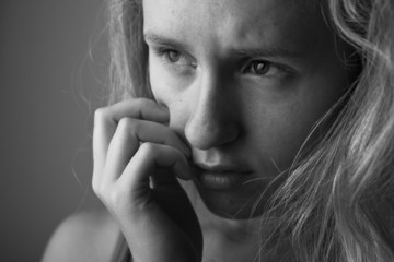 Portrait of very young depressed woman/girl(black and white)