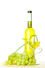 Seasoned wine and branch of green grapes