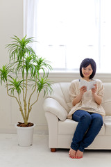 a young asian woman reading book