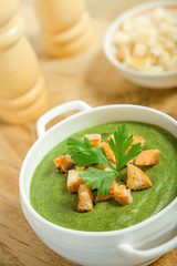 Cream soup with dried crusts on the table
