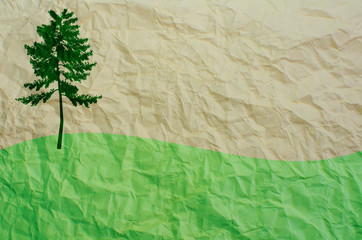 tree on recycled paper