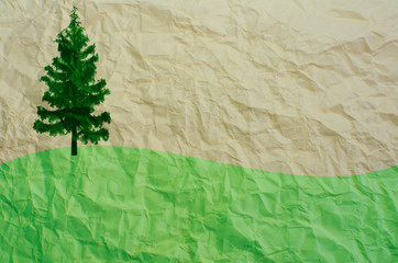 tree on recycled paper
