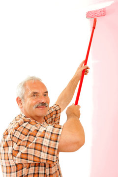 Senior man renovating home
