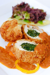 Breaded chicken stuffed with vegetables