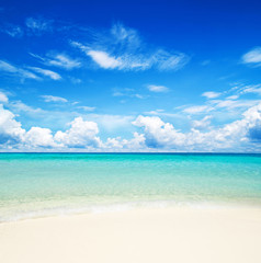 Fototapeta na wymiar Sunny Tropical Beach And Paradise Island