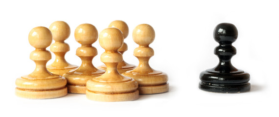 Racism between black and white pawns isolated