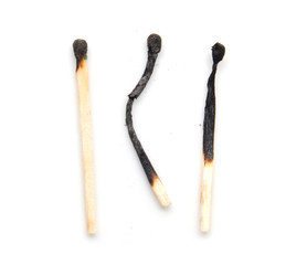 burned match on a white background