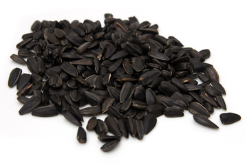 black seeds on a white background