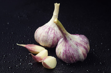 Two fresh garlic and cloves