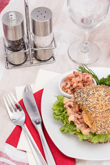 Roll with Shrimps on a red striped tablecloth