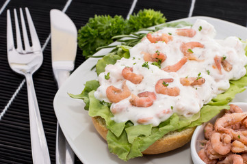 Shrimp-Salad on a roll (black background)