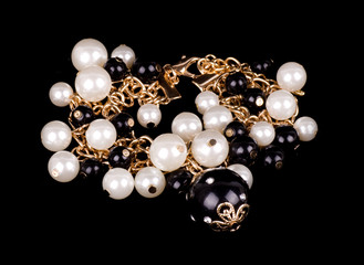 Pearl jewelry on black background