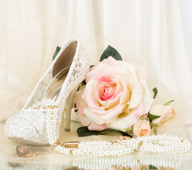 The beautiful bridal shoes, pink rose and vintage beads