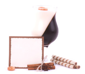 Tasty dessert with coffee beans and cinnamon with paper banner