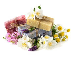 Obraz na płótnie Canvas soap bars with fresh flowers
