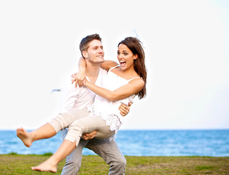 Cute Guy Carrying His Beautiful Girlfriend