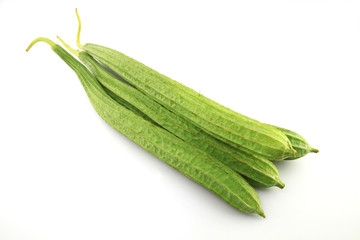 Luffa acutangula on white background