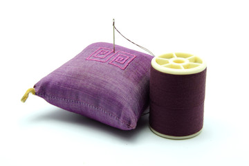 Needle and Thread Sewing Kit on White Back Ground