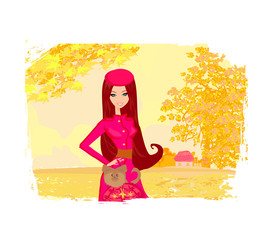 Girl walking with her dog in autumn landscape.