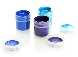 jars with multicolored gouache isolated on white background