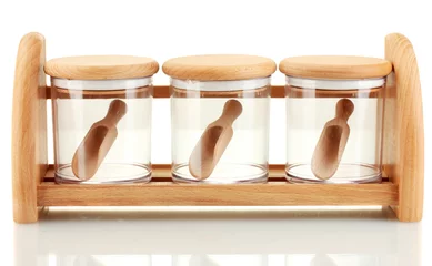 Zelfklevend Fotobehang empty glass jars for spices with spoons © Africa Studio