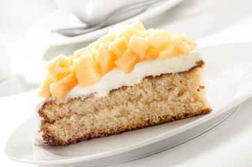 summer cake with diced honey melon