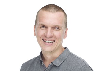 happy handsome guy smiling in camera