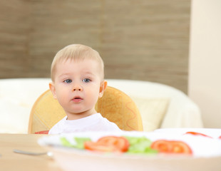 Little boy at breakfast