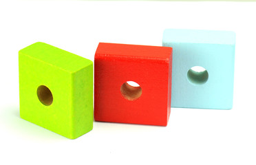 Wooden building blocks isolated on white background