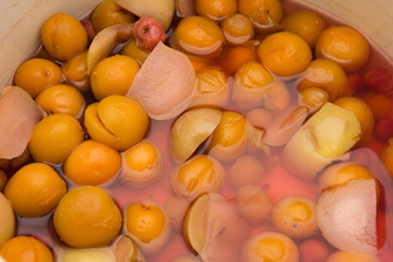 apricot jam in the background