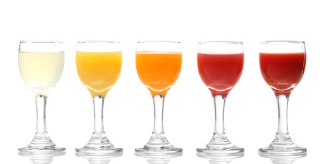 Tropical juices in glasses isolated on white