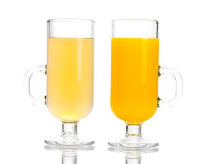 Tropical juices in glasses isolated on white