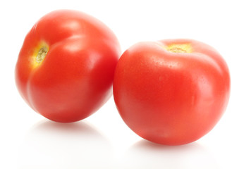 Ripe red tomatoes isolated on white