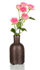 Pink roses in vase isolated on white