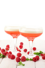 fruit jelly with berries in glasses on wooden table
