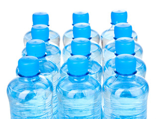plastic bottles of water isolated on white