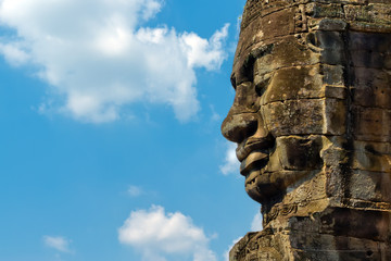 Angkor Face against blue sky, Angkor Thom, Cambodia