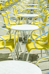 Empty tables of street cafe