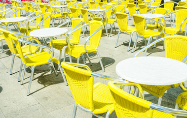Empty tables of street cafe