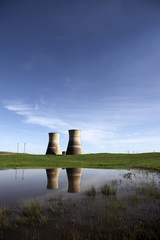 Reflection of idle nuclear power towers.