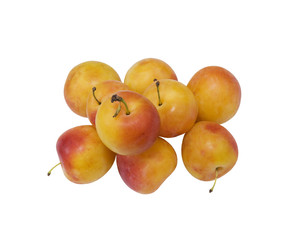fresh yellow plums on a white background