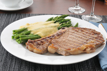 Grilled rib steak and asparagus