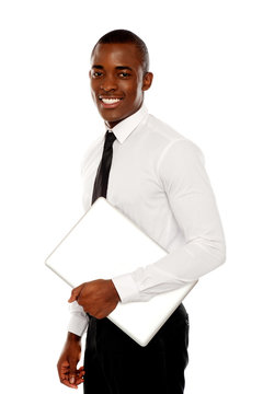 African Businessman Carrying Laptop